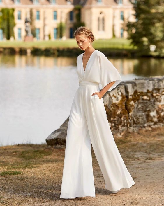 Women's Jumpsuit With A V-neck And Wide Legs—an Elegant, Flowing Design For Weddings And Summer Celebrations